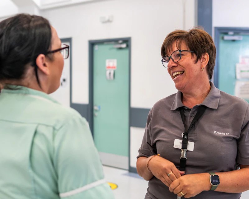 Healthcare professional speaking with a patient